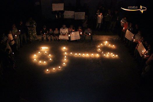 The candles spell out "Gaza". Photo taken in Aleppo.